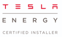 Logo with "Tesla Energy Certified Installer" text, featuring "Tesla" in red uppercase letters and "Energy" and "Certified Installer" in gray uppercase letters.